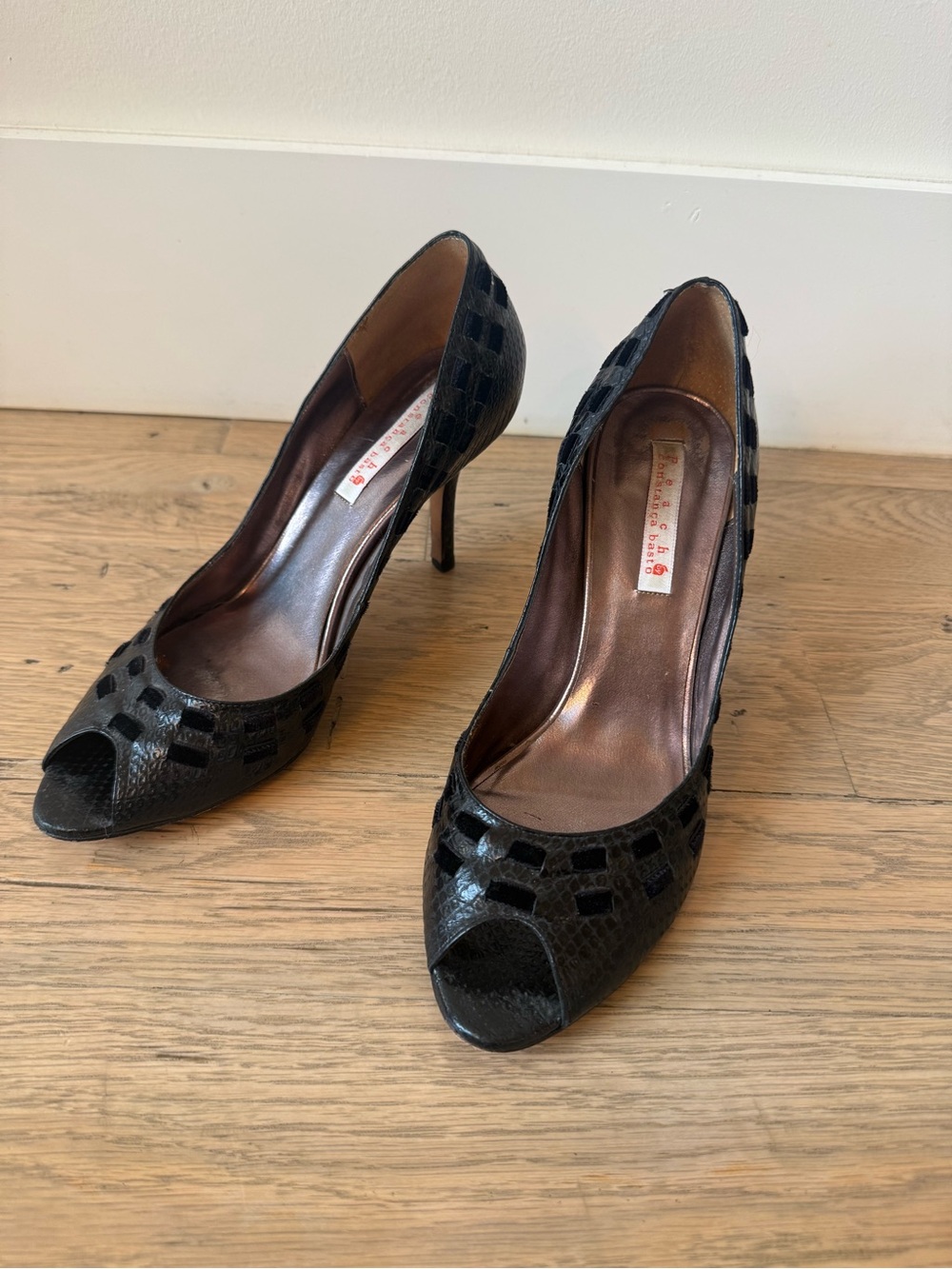 Peep-toe heel. Black snakeskin with velvet ribbon detail. Size 8.5.